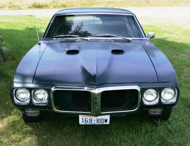 On top of all that look at those open hood scoops.  Wonder if they work?  Why do you suppose that the Pontiac engine is no longer in the bay?  Kinda made me wonder.
