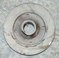Just take a look see at this poor neglected Harmonic Balancer.  You can tell that it has been resting so long that the dust is thick on the surface.  Now that can be a good thing or the death blow.  If the rubber is cracked between the hub and ring  th...